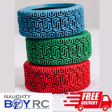 Three RC rally car and touring car tires stacked up. 4wd fast rc car tires like traxxas, hpi, losi and more.