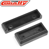 Two black plastic rectangular spacers designed for RC car parts with mounting holes, identified as Team Corally C-00180-562 4mm Center Diff Spacer.