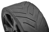 Close-up of black high-performance radio control car tire with detailed tread pattern, labeled Team Corally XL6S Street Tires Sprint RXA Low Pro Pre-glued (2) Asuga XLR 1/7th designed for improved grip and durability.
