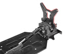 Close-up of Team Corally C-00180-423 Rear Shock Tower 5mm Swiss 7075 T6 mounted on an RC car chassis, showcasing durable aluminum construction for enhanced radio control parts performance.
