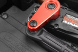 Close-up of a red aluminum servo horn attached with two black screws to an RC car steering servo, highlighting radio control parts and mechanical detail for Team Corally C-00180-171 6mm Steel Ball (2).