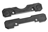 Team Corally COR00180-977 Suspension Arm Mount Covers in black plastic, designed as durable rc car parts for radio control vehicles.