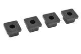 Team Corally C-00180-048 Bushings Set 0 Deg Composite (4pcs) shown as four black composite square bushings with round central holes for radio control car parts.