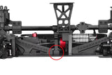 Close-up view of an rc car suspension and chassis assembly highlighting the Team Corally C-00180-562 4mm Center Diff Spacer installed in the center differential area.