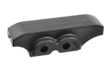 Team Corally COR00180-869 Chassis Brace Cover in black plastic, designed as a durable replacement part for radio control car chassis protection.