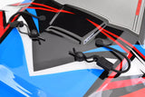 Team Corally C-00180-614 Body Clip Retainer w/ Body Clip Black (6) attached to a blue, red, and black remote control car body, securing the body shell in place for RC car use.
