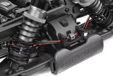 Close-up of the Team Corally C-00180-197 Front Anti-Roll Bar 2.4mm installed on an RC car chassis, showcasing suspension detail and radio control parts.