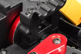 Close-up of the Team Corally C-00180-018 Center Differential Bulkhead installed in an rc car chassis showing detailed parts and screws.