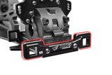 Team Corally C-00180-142 Aluminum Suspension Arm Mount PRO Rear-Rear in black anodized finish installed on an RC car chassis, featuring durable 7075 aluminum construction for enhanced performance.