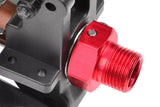 Close-up of a red anodized metal component connected to a black mechanical part, featuring a small steel pin as part of the Team Corally C-00180-122 Steel Pin 2.5x17mm (10) set used in radio control parts for rc cars.