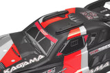 Close-up of a radio control car roof featuring the Team Corally C-00180-982 Roof Skids Set in black, mounted on a red, black, and gray rc car body with detailed decals.
