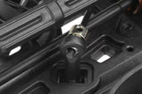 Close-up of Team Corally C-00180-220 Steel Ball End 5.8mm for Anti Roll Bar (4) installed on a black radio control car chassis part.