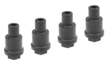 Set of four black cylindrical Team Corally C-00180-1010 Shock Spacer (4) components for radio control car suspension systems.