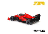 Team Saxo TS01946 1/10 F1 Body Shell (Clear) shown as a finished red and black painted radio control car body shell with detailed decals and aerodynamic design.