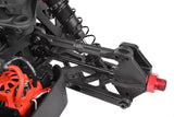 Close-up of Team Corally COR00180-553-1 Rear HD Camber Links Truggy/MT 135mm (2) installed on a radio control car chassis, showcasing durable black suspension components and red anodized metal parts.