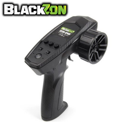 BlackZon BZN540484 BTX-343- 2.4GHz 3Ch Transmitter Spryte Turbo handheld radio control transmitter for precise control of RC cars, featuring ergonomic grip and multiple control buttons.