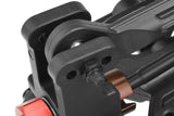 Close-up view of a mechanical assembly featuring the Team Corally C-00180-293 Steel Ball 6.8mm (4) integrated within a black suspension arm and red anodized aluminum component, suitable for radio control parts and rc car repairs.