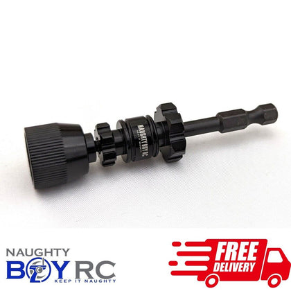 Naughty Boy RC Tire Break In Tool 2in1 12mm 17mm in black metal designed for efficient rc car tires maintenance and break-in with precision grip and sturdy construction.